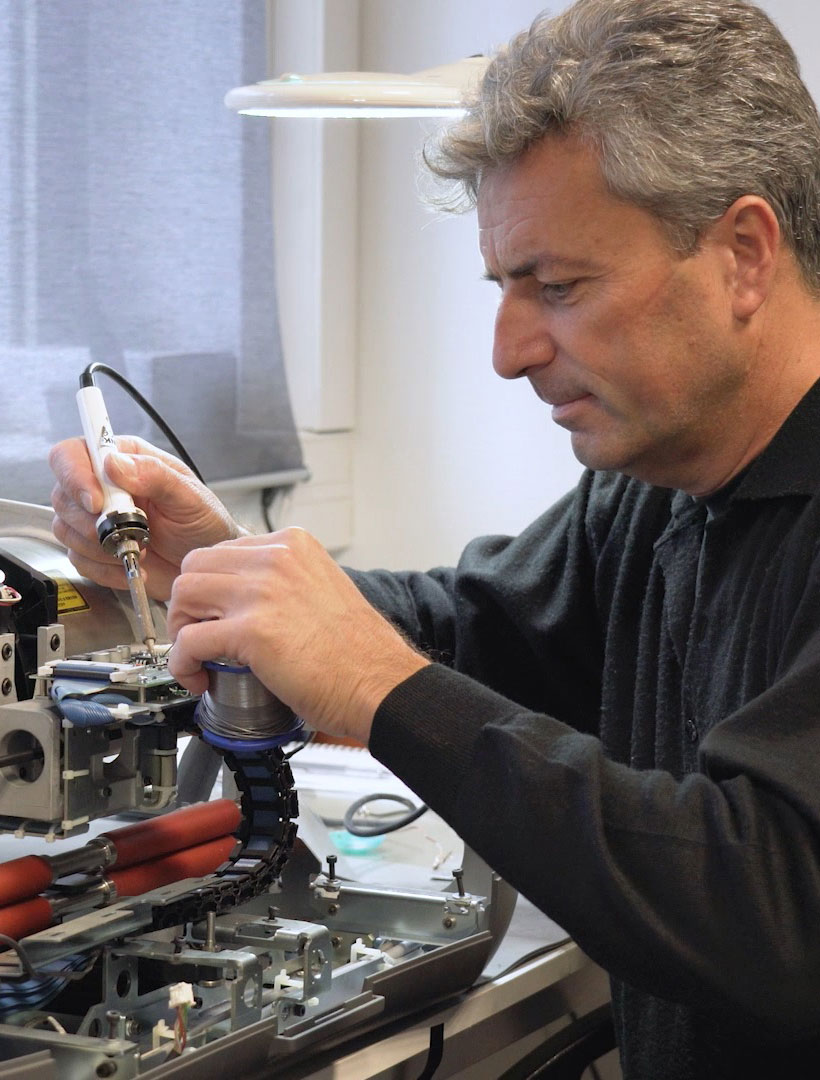 GER technician working on a machine